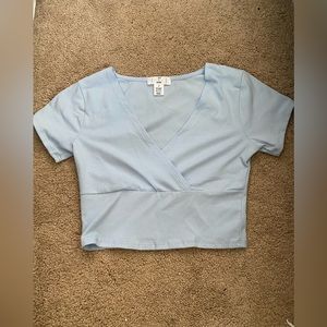 light blue cross crop tee